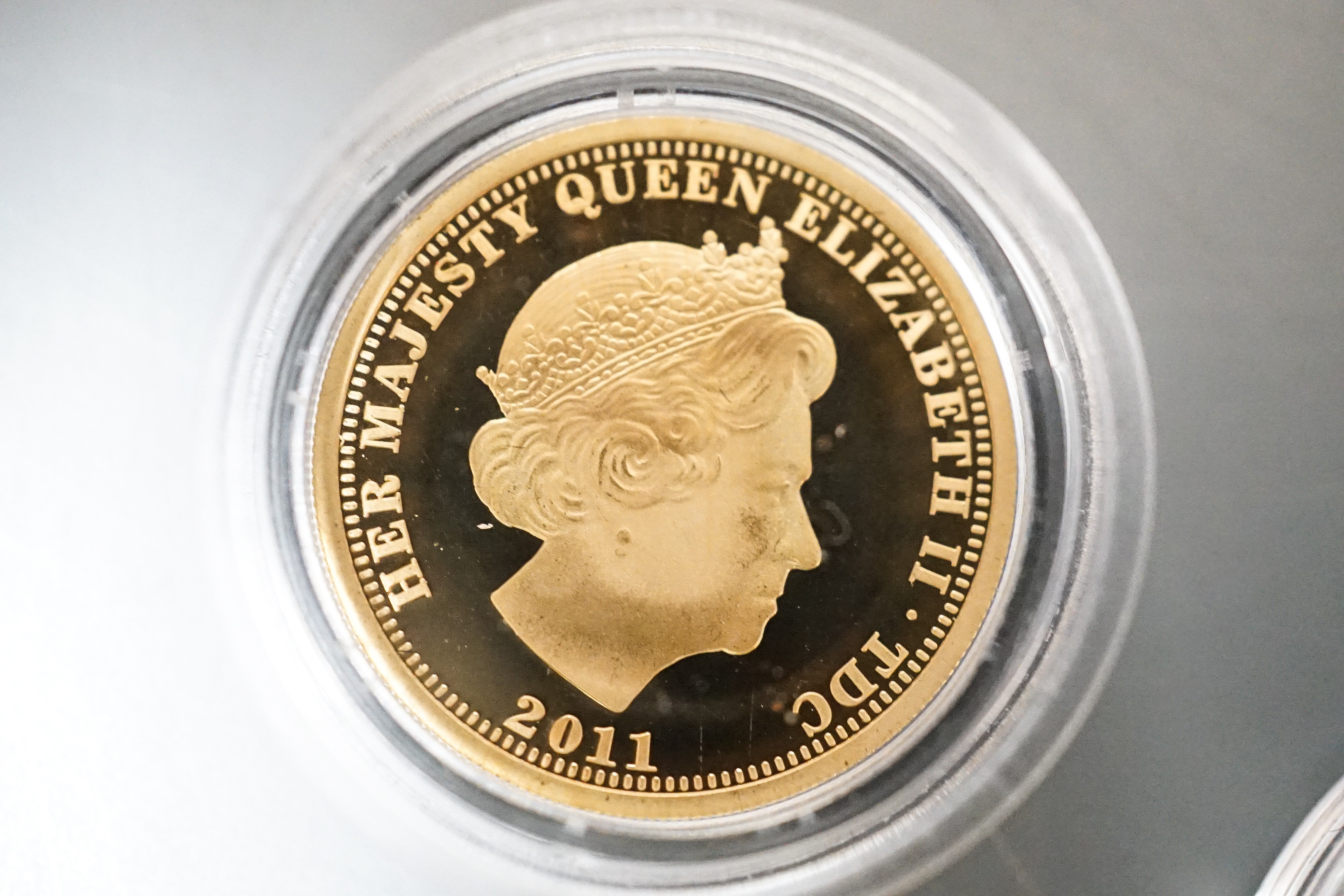 A London Mint Tristan da Cunha gold double crown and a similar gold one crown, cased with certificates